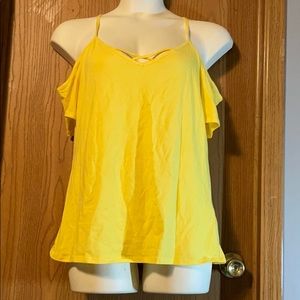 Bright yellow open shoulder shirt